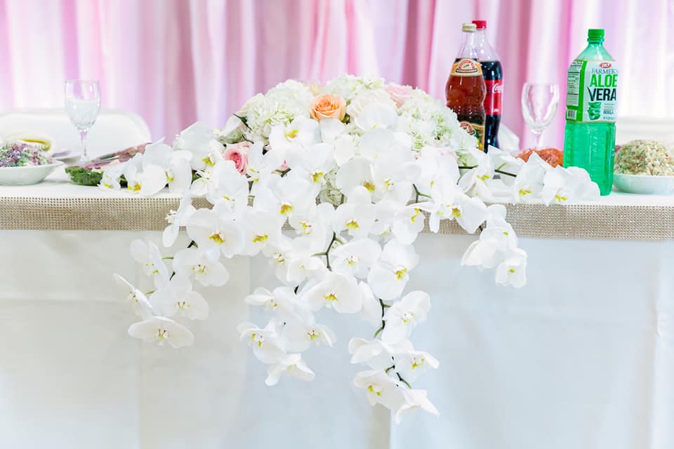 All-white Cascading Sweetheart Table Arrangement